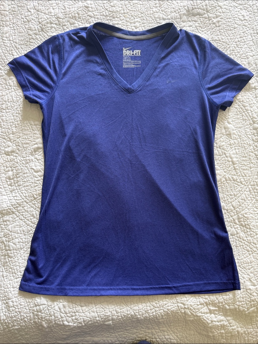 Nike Women’s Blue Dri-FIT V-Neck Short Sleeve Tee